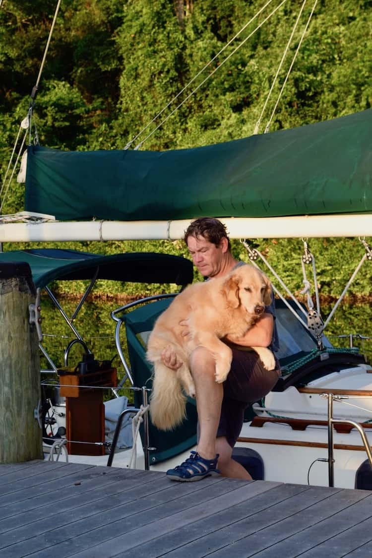 Dear dog-boat, which is lifted by the sailboat.